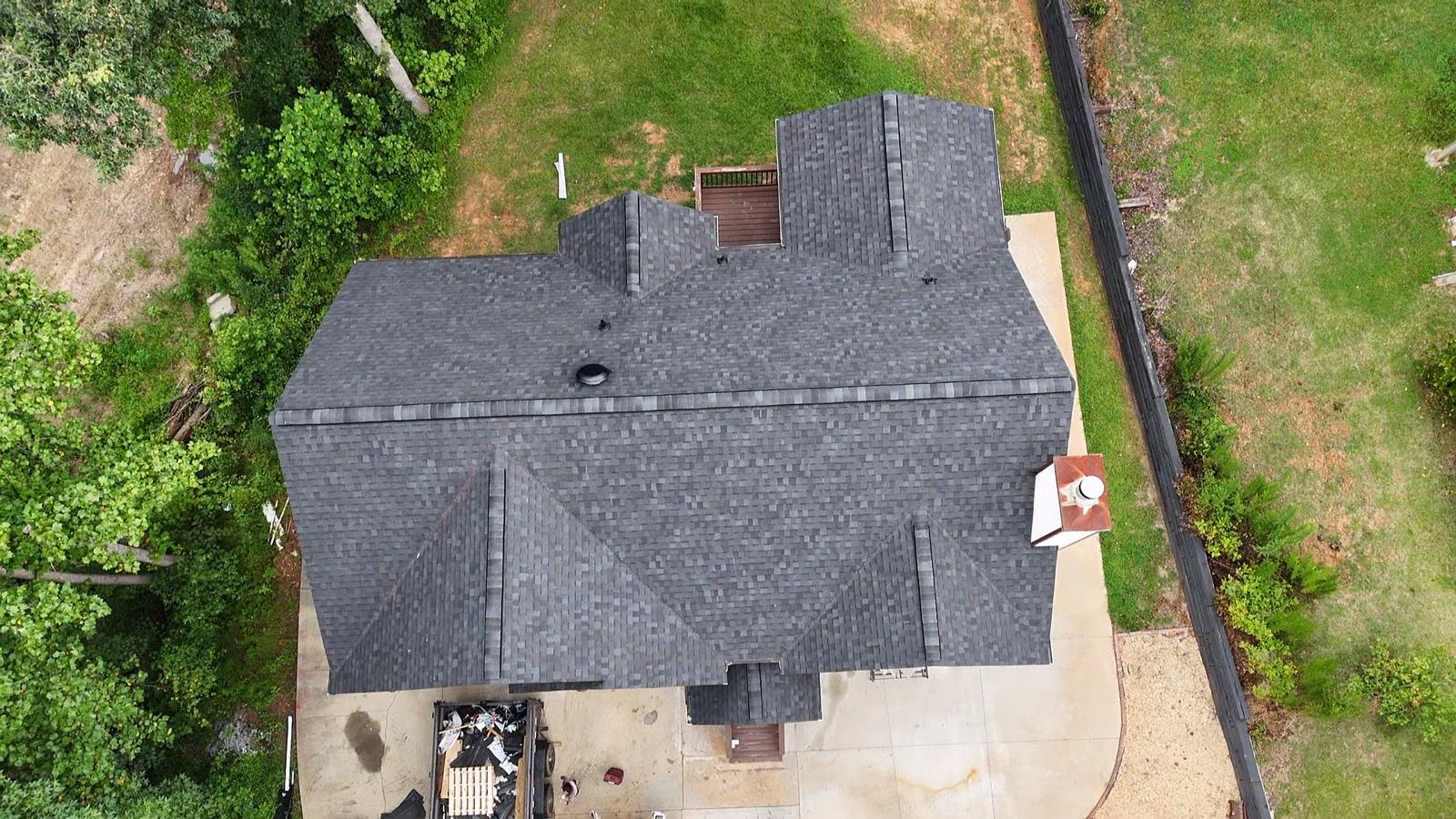 Aerial view of the same roof after installing new architectural asphalt shingles